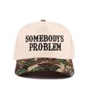 SOMEBODYS PROBLEM TRUCKER HAT- CAMO