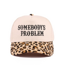 SOMEBODYS PROBLEM TRUCKER HAT- LEOPARD